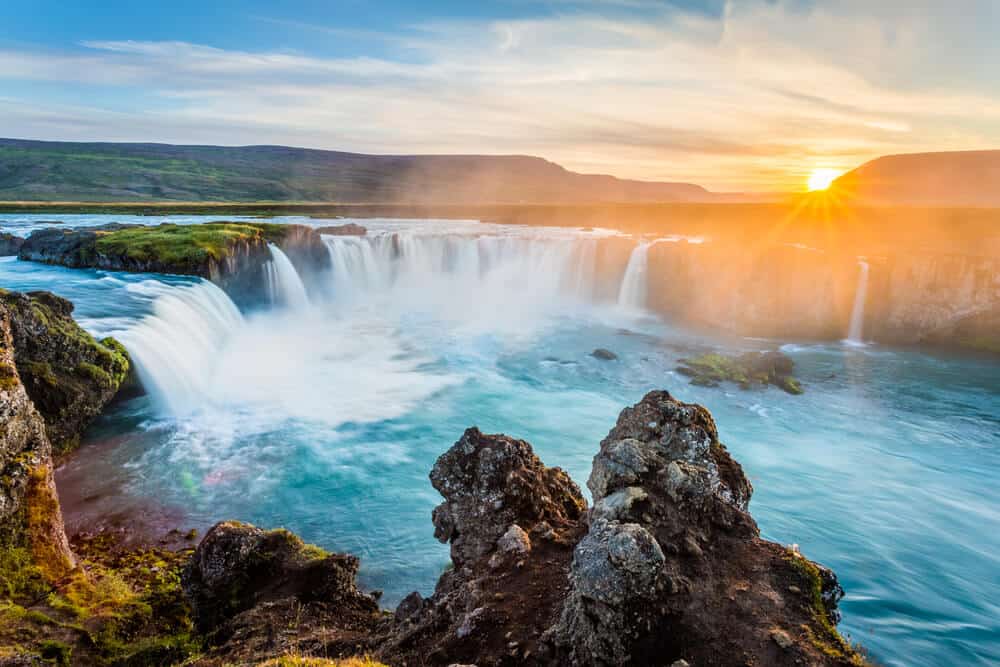 Godafoss waterfall at sunset in summer - one of the best times to visit Iceland
