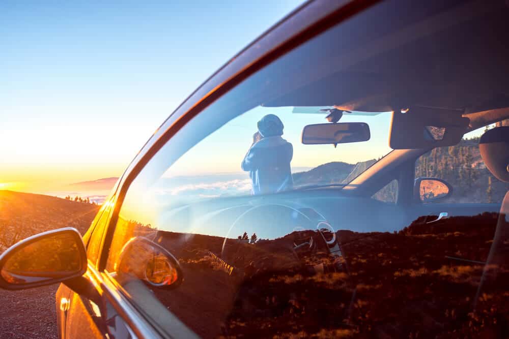 Campervan traveling in the midnight sun in Iceland