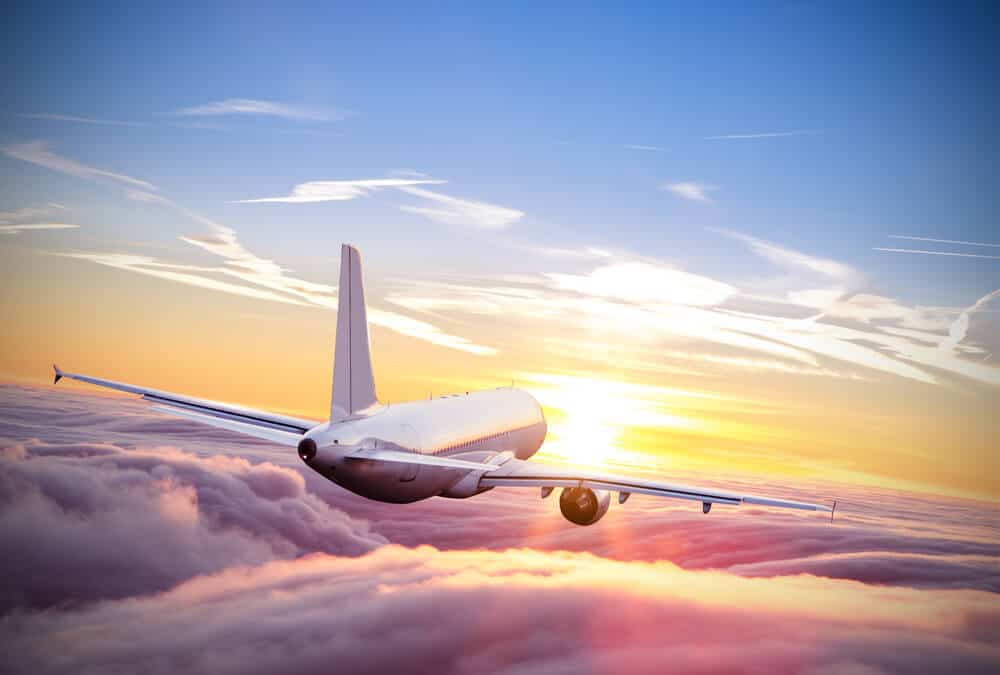 Plane flying into the horizon with Iceland Air