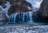 Bruarfoss with snow in Iceland in April