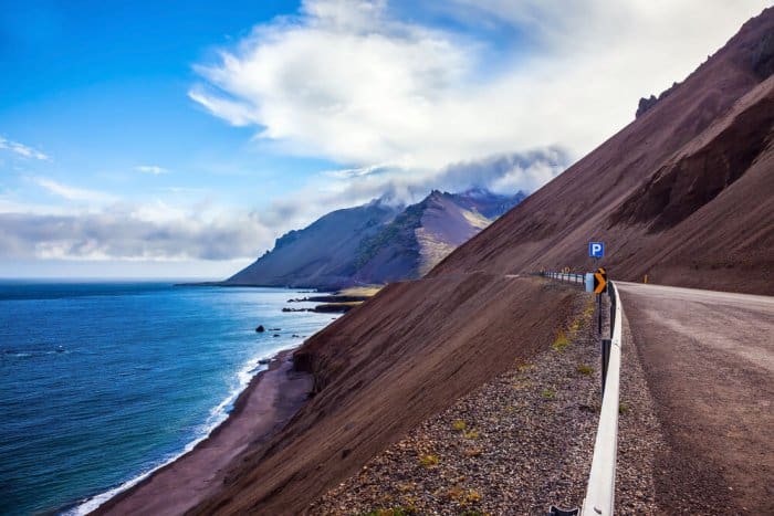 July road with sea in Iceland
