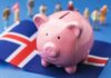 Piggy bank over a flag of Iceland