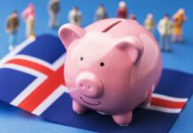 Piggy bank over a flag of Iceland
