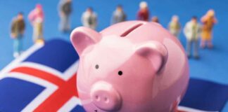 Piggy bank over a flag of Iceland