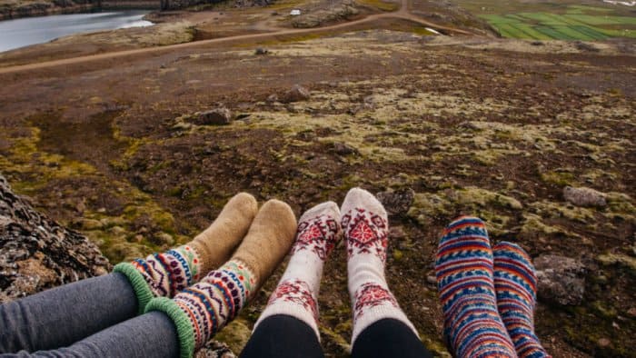 Friends with wool socks on Iceland camping trip
