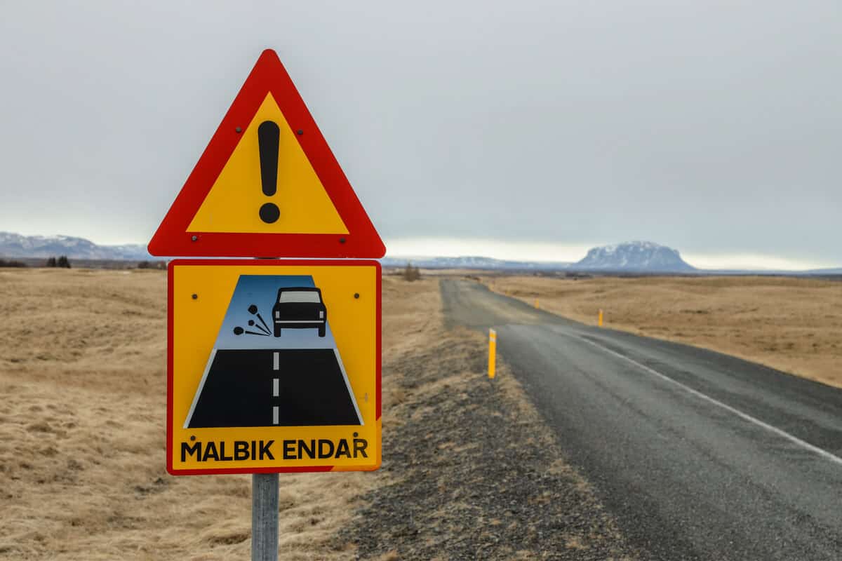 Iceland driving safety Malbik Endar change from paved to gravel