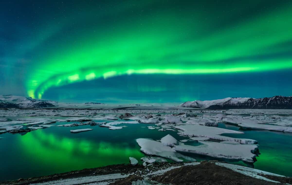 Northern Lights in Iceland in February over Jökulsárlón glacier lagoon