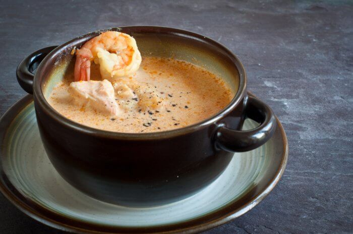 Typical Icelandic salmon soup with shrimp