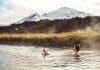 Woman soaking at an Icelandic geothermal hot pot