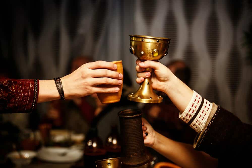 Medieval toast with cups at Icelandic festival