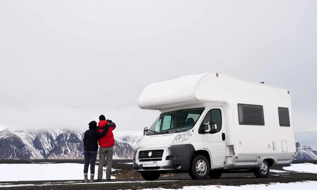 Couple renting a motorhome for their Iceland camping trip