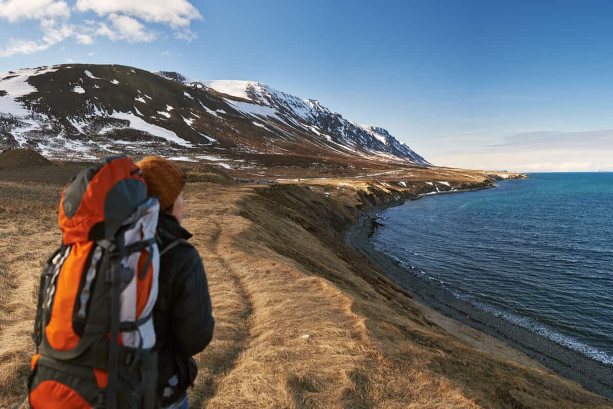 Iceland solo travel backpacker exploring the coast