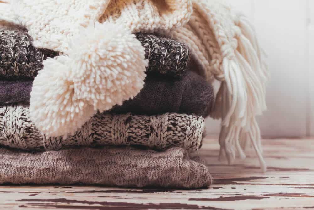 Pile of knit wool clothing for winter in Iceland