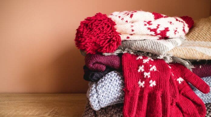 Suitcase filled with winter clothes for Iceland