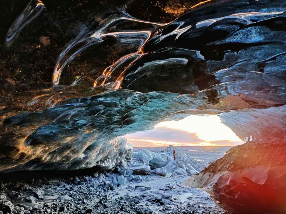 crystal-blue ice caves, formed by melting glaciers