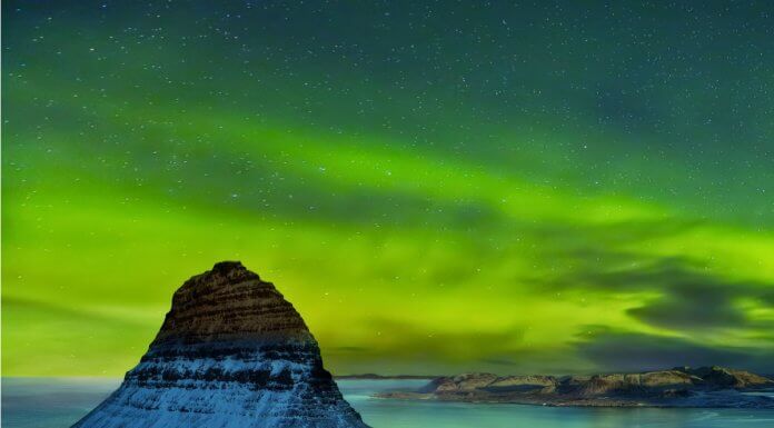Iceland's Northern Lights over Kirkjufell mountain in winter