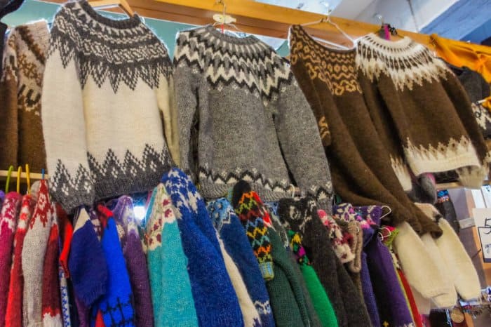 Traditional Icelandic lopapeysa sweaters on the roadside