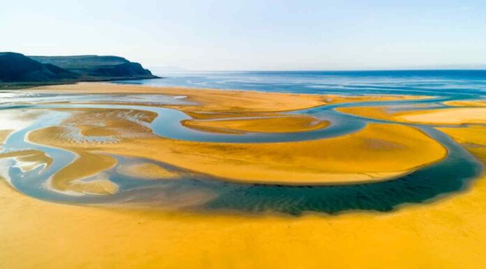 Panoramic views of Raudisandur beach