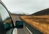 View from the side of a camper on a road trip