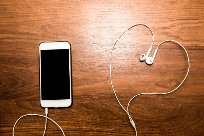 Smartphone with a best road trip songs playlist