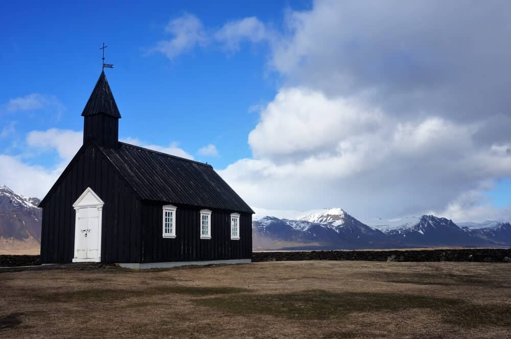 The black Budir church is a striking monument in Snaefellsnes peninsula
