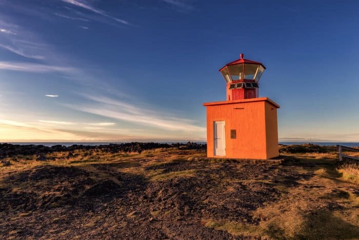 Famous orange Svörtuloft lighthouse in the Snaefellsnes peninsula