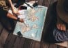 People planning their Iceland trip with a map