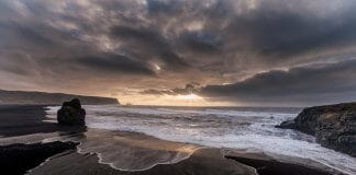 Volcanic black sand beaches near the seaside town of Vík