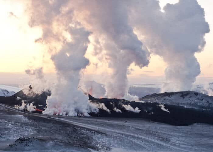 smoke coming out of the crater of some icelandic volcanoes