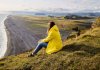 Girl checking the scenery in the mild Iceland weather in August