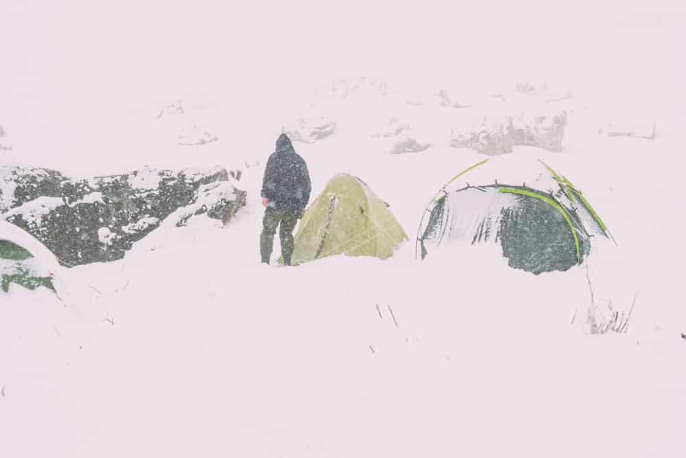 Tent campers after snowstorm in Iceland